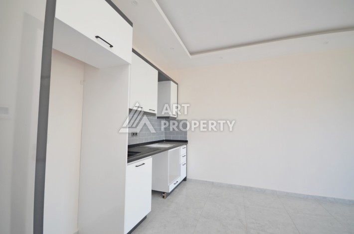 Видовая двухкомнатная квартира 55 кв.м. в новой резиденции. Авсаллар, Алания. - Ракурс 12