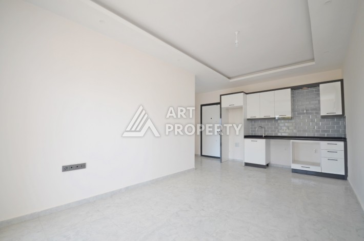 Видовая двухкомнатная квартира 55 кв.м. в новой резиденции. Авсаллар, Алания. - Ракурс 14