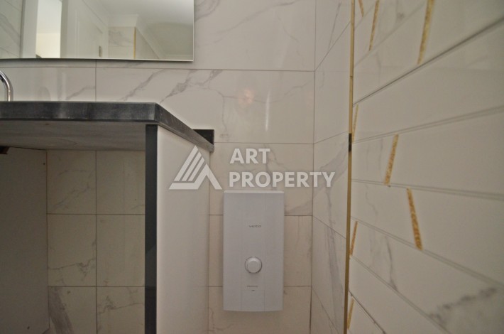 Видовая двухкомнатная квартира 55 кв.м. в новой резиденции. Авсаллар, Алания. - Ракурс 21