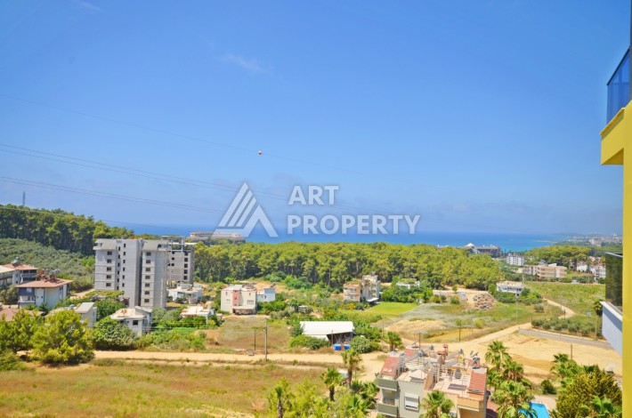 Видовая двухкомнатная квартира 55 кв.м. в новой резиденции. Авсаллар, Алания. - Ракурс 24