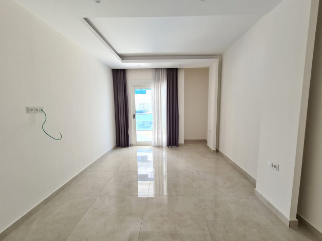 Апартаменты 2+1 в 250 метрах от моря в Махмутлар, 110 м2 - Ракурс 6