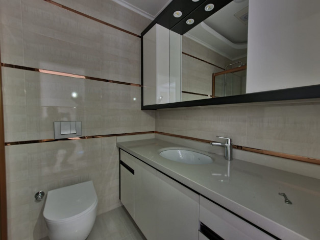 Апартаменты 2+1 в 250 метрах от моря в Махмутлар, 110 м2 - Ракурс 7