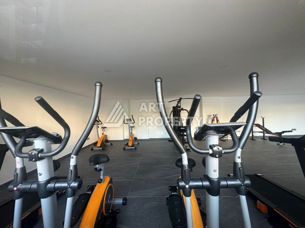 Квартира 2+1 с видом на море и горы, 75 кв.м. в Махмутларе - Ракурс 11