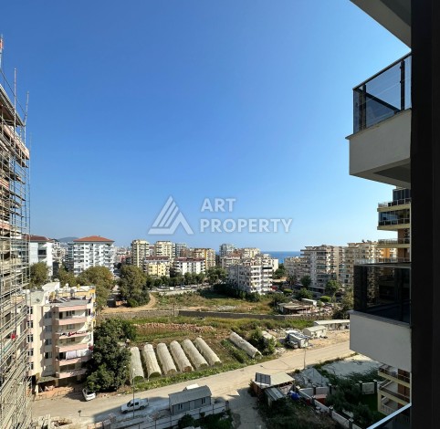 Квартира 2+1 с видом на море и горы, 75 кв.м. в Махмутларе - Ракурс 14