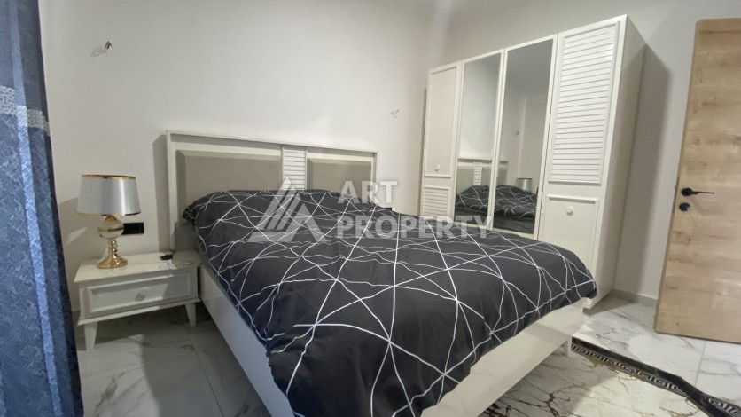 Двухуровневая квартира 2+1 с панорамным видом в Авсалларе, 120 кв.м. - Ракурс 8