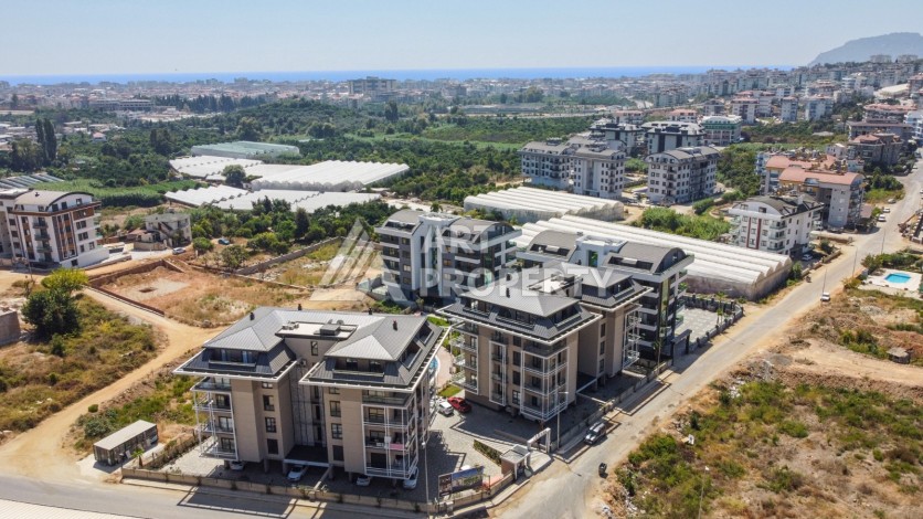 Квартиры 2+1 и 3+1 в качественном ЖК в районе Оба. Выгодно! - Ракурс 11