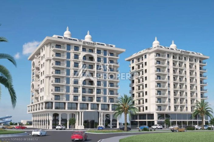 Квартира 1+1 в новом доме, 45 кв.м. Центр Махмутлара. - Ракурс 2