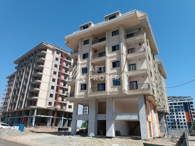 Квартира 1+1 в новом доме, 45 кв.м. Центр Махмутлара. - Ракурс 16