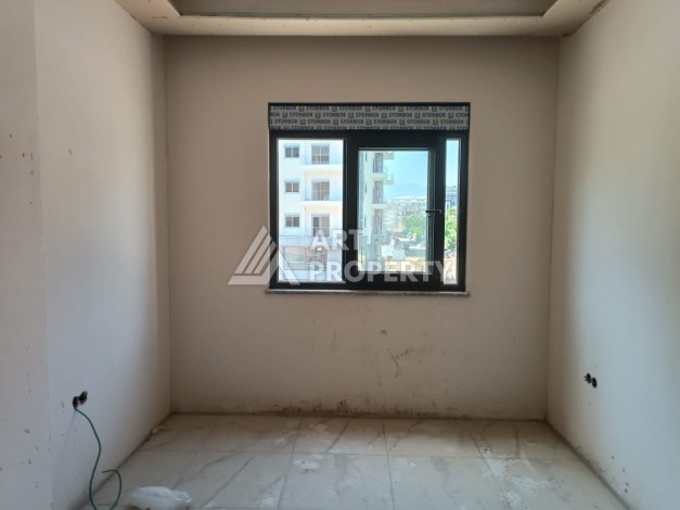 Квартира 1+1 в новом доме, 45 кв.м. Центр Махмутлара. - Ракурс 25