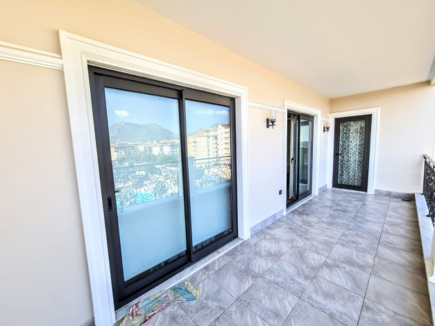 Трехкомнатная квартира с видом на море в шикарном комплексе премиум класса в районе Махмутлар, 100 м2 - Ракурс 6