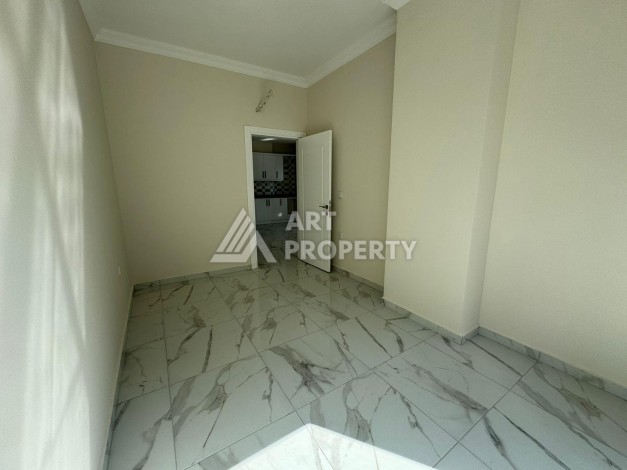 Просторная квартира 1+1 в Махмутларе, 60 кв.м. - Ракурс 22