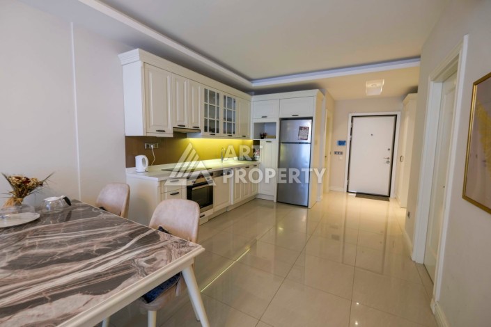 Комфортабельные апартаменты 1+1 с садом, 80 кв.м.. Первая береговая линия в Кестеле. - Ракурс 2