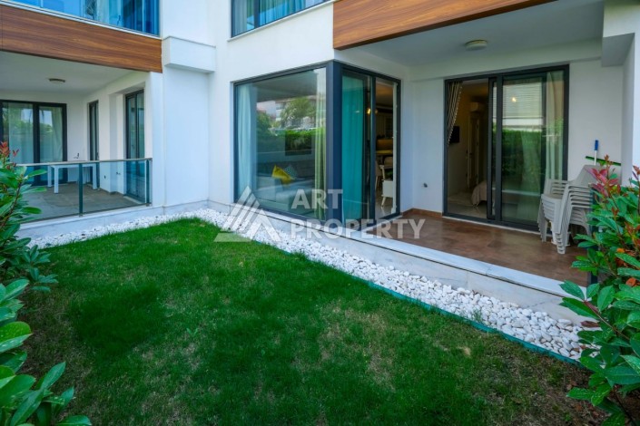 Комфортабельные апартаменты 1+1 с садом, 80 кв.м.. Первая береговая линия в Кестеле. - Ракурс 19