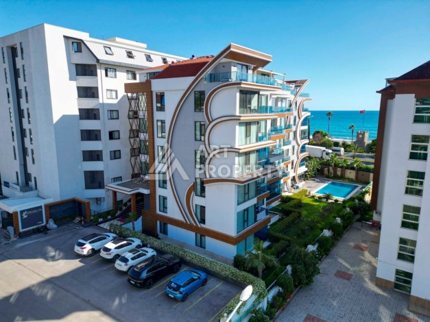 Комфортабельные апартаменты 1+1 с садом, 80 кв.м.. Первая береговая линия в Кестеле. - Ракурс 25