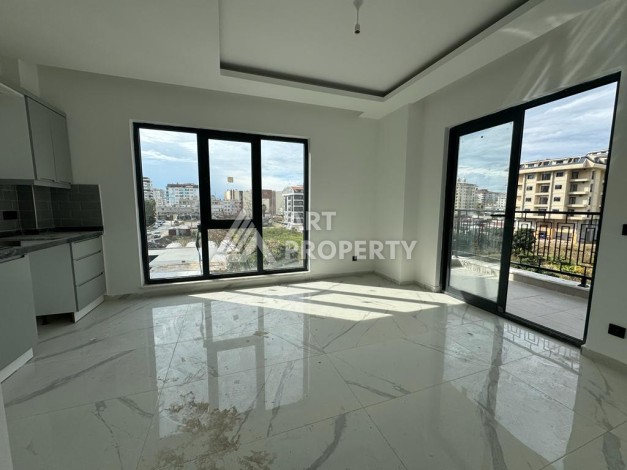 Современная квартира 1+1 в центре Махмутлара, 50 кв.м. - Ракурс 10