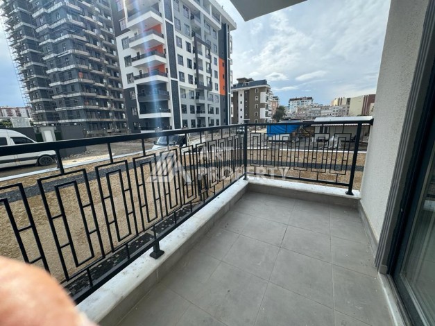 Современная квартира 1+1 в центре Махмутлара, 50 кв.м. - Ракурс 12