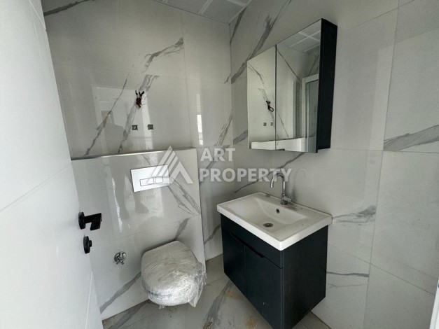 Современная квартира 1+1 в центре Махмутлара, 50 кв.м. - Ракурс 14