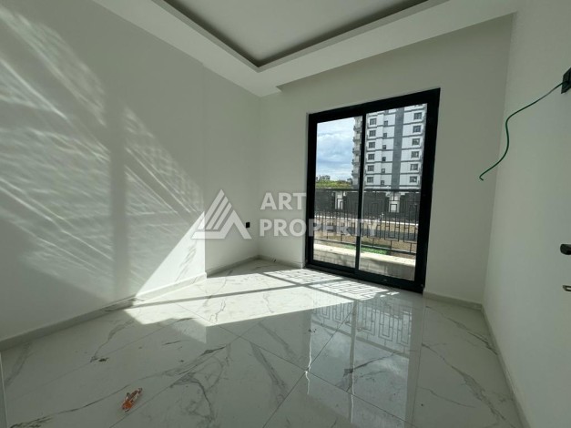 Современная квартира 1+1 в центре Махмутлара, 50 кв.м. - Ракурс 15