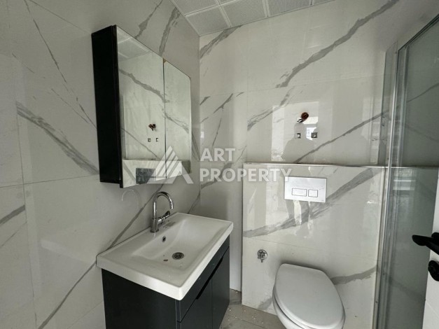 Современная квартира 1+1 в центре Махмутлара, 50 кв.м. - Ракурс 16