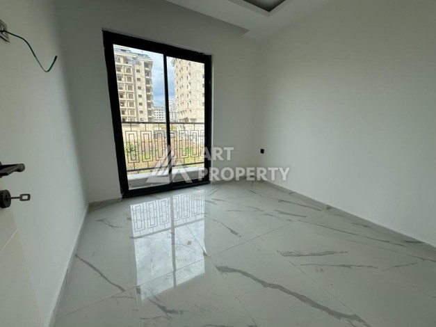 Современная квартира 1+1 в центре Махмутлара, 50 кв.м. - Ракурс 17