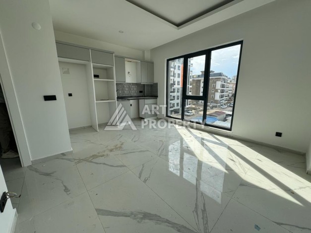 Современная квартира 1+1 в центре Махмутлара, 50 кв.м. - Ракурс 19