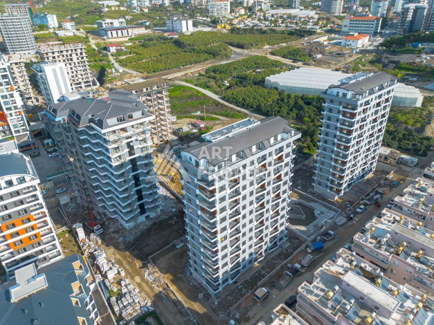 Квартира 2+1 в элитной новой резиденции, 600 м от моря в Махмутларе - Ракурс 12