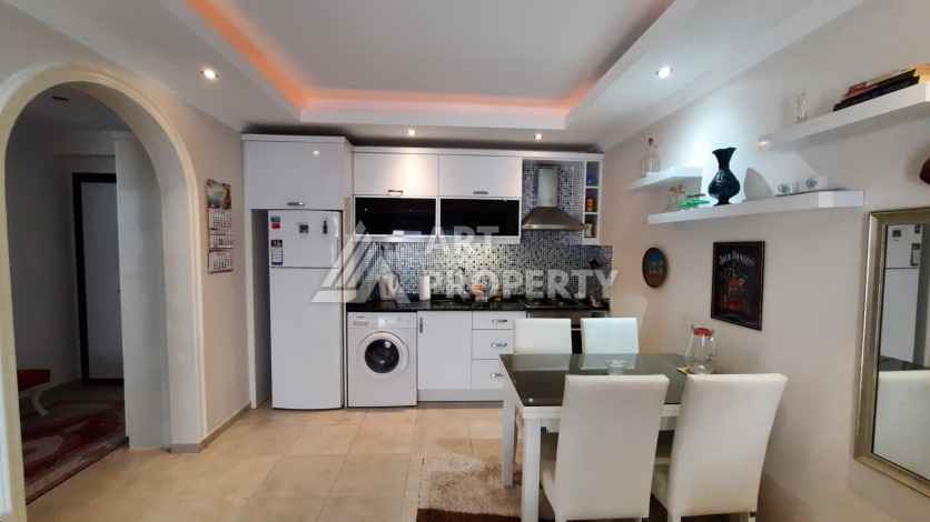 Просторная меблированная квартира 1+1 в 350 метрах от моря в Махмутларе. - Ракурс 2