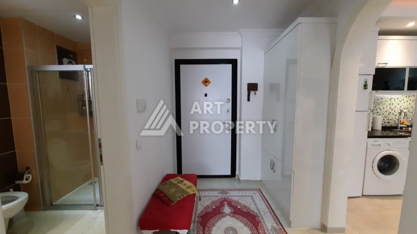 Просторная меблированная квартира 1+1 в 350 метрах от моря в Махмутларе. - Ракурс 12