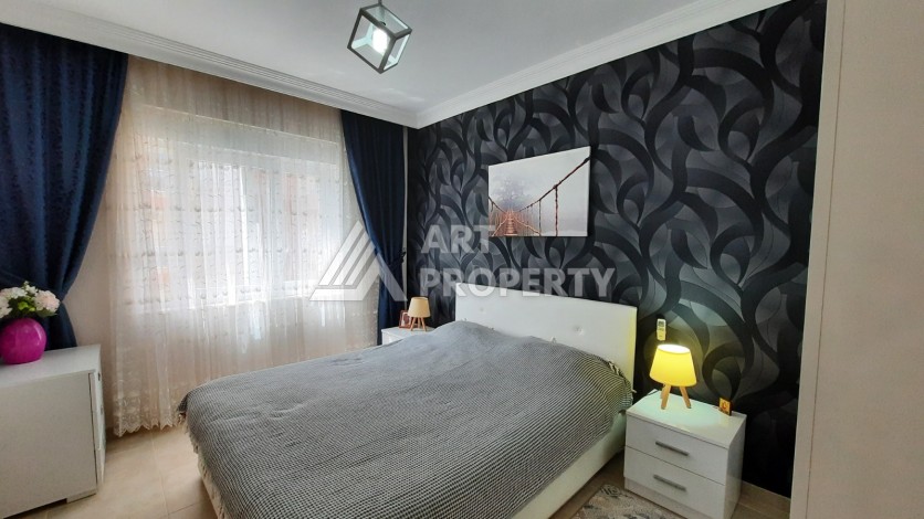 Просторная меблированная квартира 1+1 в 350 метрах от моря в Махмутларе. - Ракурс 15