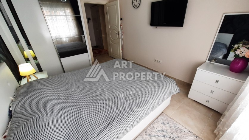 Просторная меблированная квартира 1+1 в 350 метрах от моря в Махмутларе. - Ракурс 18