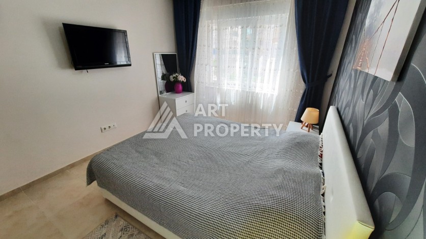 Просторная меблированная квартира 1+1 в 350 метрах от моря в Махмутларе. - Ракурс 19