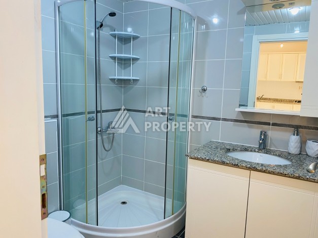 Двухкомнатная квартира с видом на бассейн в Махмутларе, 50 кв.м. - Ракурс 16