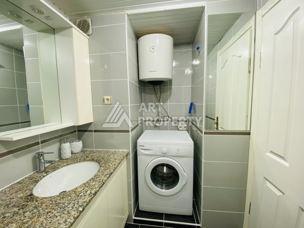 Двухкомнатная квартира с видом на бассейн в Махмутларе, 50 кв.м. - Ракурс 17