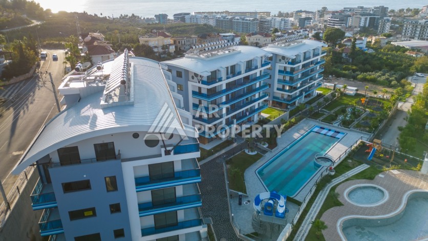 Двухкомнатная квартира 70 кв.м. в престижной резиденции, 300 м до моря. Каргыджак, Алания - Ракурс 21