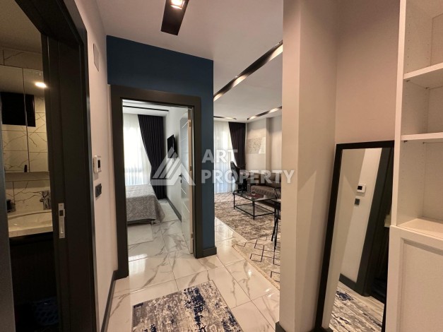 Меблированная квартира 55 кв.м. в центре Махмутлара. Новая престижная резиденция в 550 метрах от моря - Ракурс 4