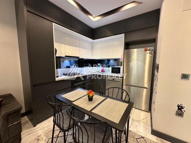 Меблированная квартира 55 кв.м. в центре Махмутлара. Новая престижная резиденция в 550 метрах от моря - Ракурс 6