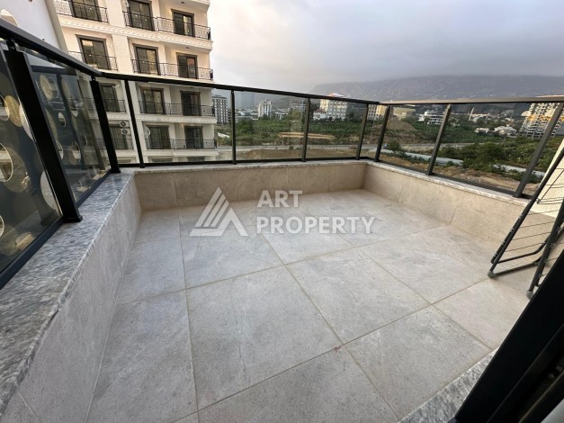 Меблированная квартира 55 кв.м. в центре Махмутлара. Новая престижная резиденция в 550 метрах от моря - Ракурс 7