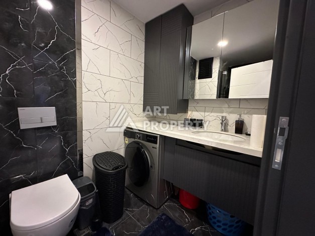 Меблированная квартира 55 кв.м. в центре Махмутлара. Новая престижная резиденция в 550 метрах от моря - Ракурс 9