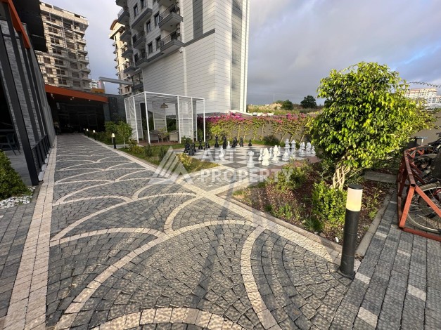 Меблированная квартира 55 кв.м. в центре Махмутлара. Новая престижная резиденция в 550 метрах от моря - Ракурс 15