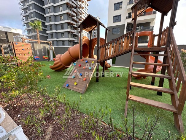 Меблированная квартира 55 кв.м. в центре Махмутлара. Новая престижная резиденция в 550 метрах от моря - Ракурс 21