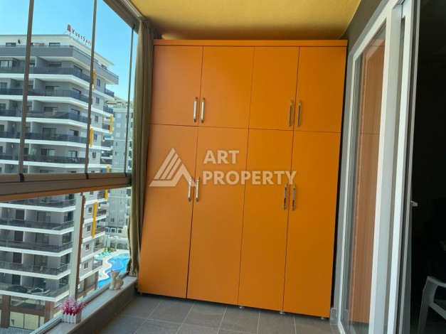 Меблированная квартира 1+1 в резиденции с отельной инфраструктурой в Махмутларе, 50 кв.м. - Ракурс 12