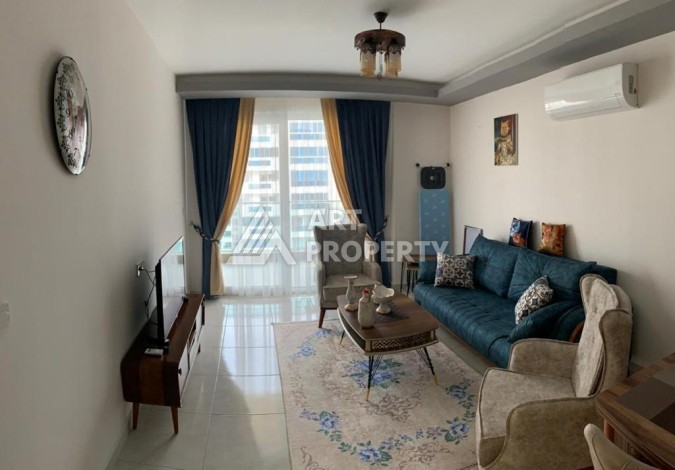 Меблированная квартира 1+1 в резиденции с отельной инфраструктурой в Махмутларе, 50 кв.м. - Ракурс 14