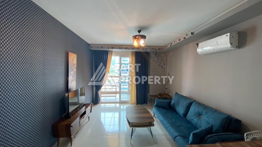 Меблированная квартира 1+1 в резиденции с отельной инфраструктурой в Махмутларе, 50 кв.м. - Ракурс 18