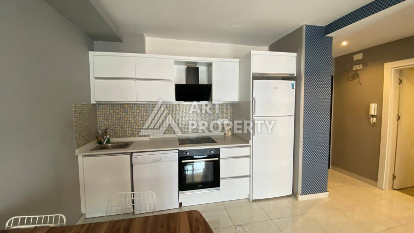 Меблированная квартира 1+1 в резиденции с отельной инфраструктурой в Махмутларе, 50 кв.м. - Ракурс 19