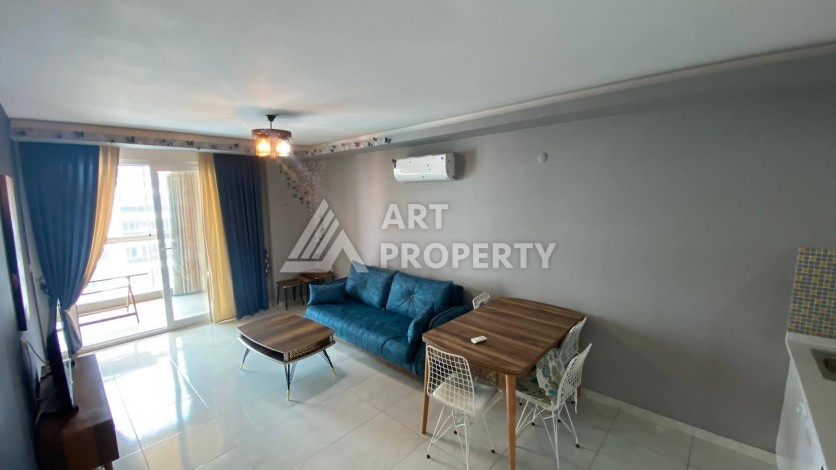 Меблированная квартира 1+1 в резиденции с отельной инфраструктурой в Махмутларе, 50 кв.м. - Ракурс 20