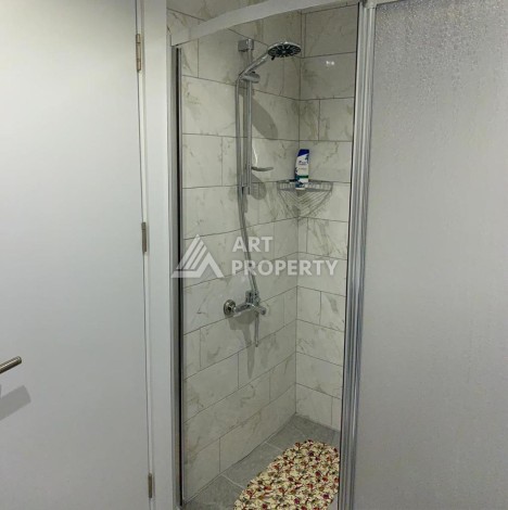 Меблированная квартира 1+1 в резиденции с отельной инфраструктурой в Махмутларе, 50 кв.м. - Ракурс 27