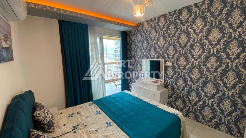 Меблированная квартира 1+1 в резиденции с отельной инфраструктурой в Махмутларе, 50 кв.м. - Ракурс 28