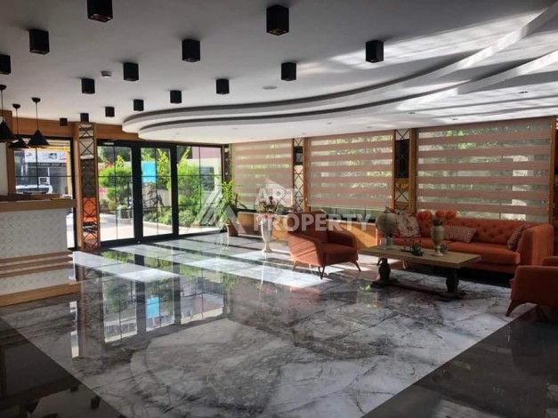 Меблированная квартира 1+1 в резиденции с отельной инфраструктурой в Махмутларе, 50 кв.м. - Ракурс 40