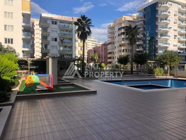 Меблированная квартира 1+1 в резиденции с отельной инфраструктурой в Махмутларе, 50 кв.м. - Ракурс 42