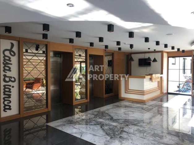 Меблированная квартира 1+1 в резиденции с отельной инфраструктурой в Махмутларе, 50 кв.м. - Ракурс 43